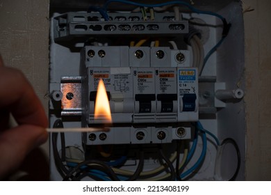 Electric Switch And Lit Match, Power Surge