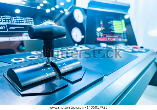 The electric train driver cabin interior.\
Driver console joystick of the electric train. Dashboard devices.\
The control lever of the train. Railway suburban transport.\
Passenger suburban\
transport.