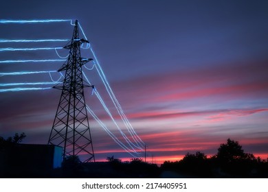 Electric transmission towers with glowing wires against the sunset sky background. High voltage electrical pylons. Energy concept.