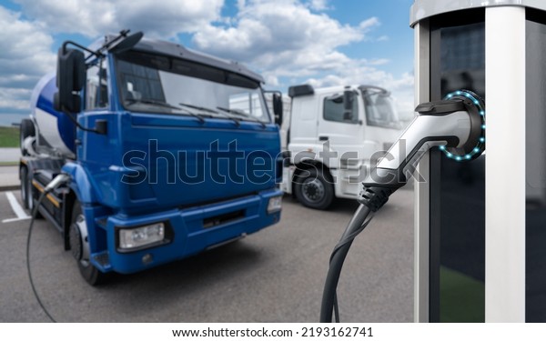 Electric truck batteries are charged from the\
charging station.\
Concept