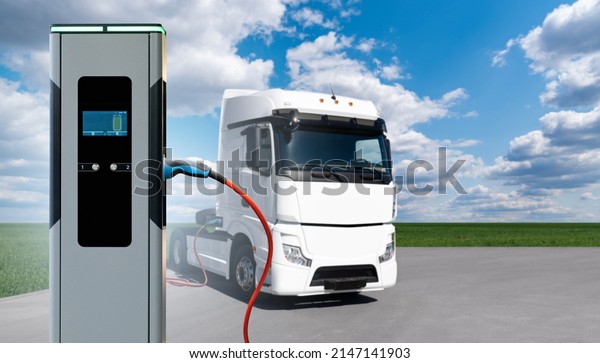 Electric truck is charged from the charging\
station. Concept