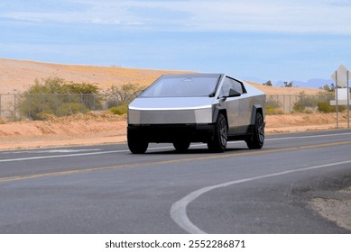 an electric truck Tesla Cybertruck driving on a rural road