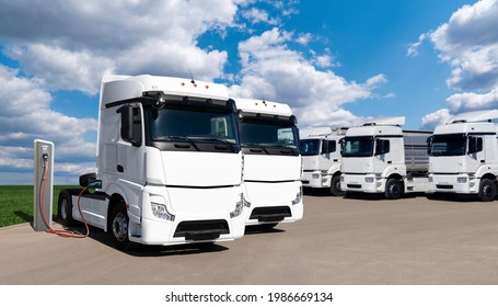 Electric Trucks With Charging Station. Concept