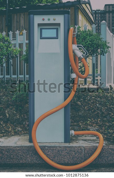 Electric vehicle charging\
station.