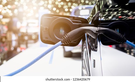 Electric Vehicle Charging Station For Home With EV Car Background