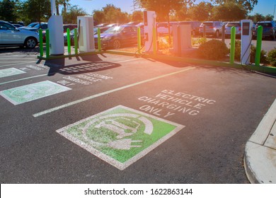 Electric Vehicle Charging Station Sign In A Parking Bay, California, USA.