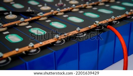 Electric vehicle lithium NMC battery. Electric car battery. Lithium-ion cell pack. Lithium NMC rechargeable battery. EV car energy storage. High voltage electric vehicle batteries. Automotive battery. Foto stock © 