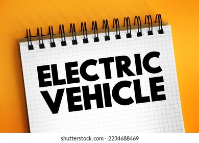 Electric Vehicle - vehicles that are either partially or fully powered on electric power, text concept on notepad - Shutterstock ID 2234688469