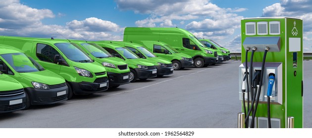 Ladestation für Elektrofahrzeuge auf einem Hintergrund einer Reihe von Lieferwagen. Ökologisches Verkehrskonzept