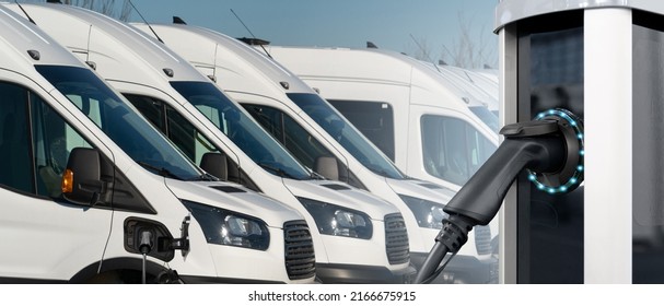 Electric vehicles charging station on a background of a row of vans. Concept - Shutterstock ID 2166675915