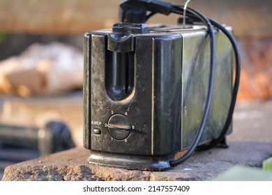 Electric Waste In The Landfill, Old Toaster.