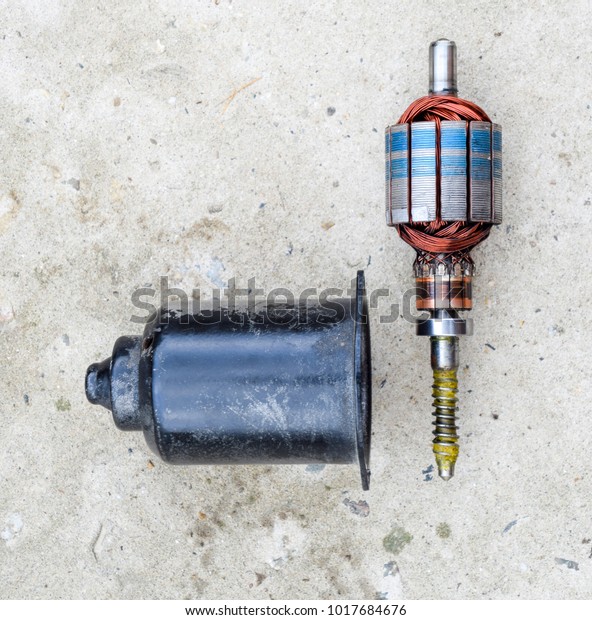Electric wiper motor for car wipers. Disassembled\
electric motor.