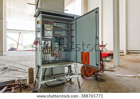 Electrical cabinet with connectors is providing electrical energy to construction site. 商業照片 © 