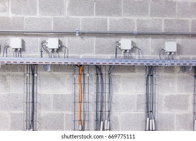 Electrical cables are located in a cableway in a building