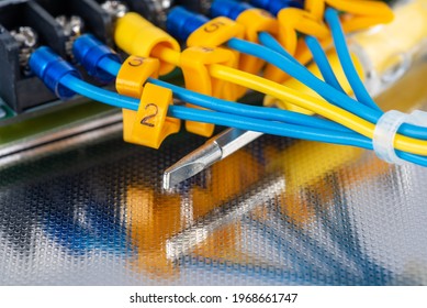 Electrical cabling and hand tool on metal sufrace service and re