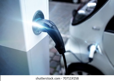 electrical car charging on a charging pillar