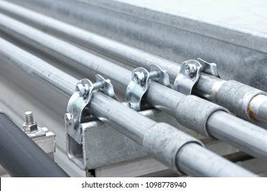 Electrical Conduit with Clamp Installation on Roof