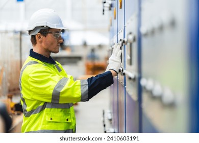 Electrical engineer inspection control panel and commissioning during pressure steam drum, Electric control panel open enclosure for automatic circuit system in industrial factory, switchgear box