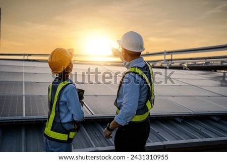 Similar – Image, Stock Photo Installation of solar or photovoltaic panels on the roof of family house observed during sunny day in a Swiss village. There are trees and bushes around the house.