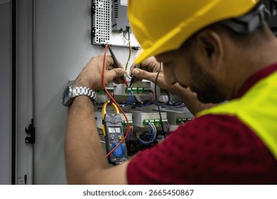 An electrical engineer performs daily tasks in the high-voltage field.
