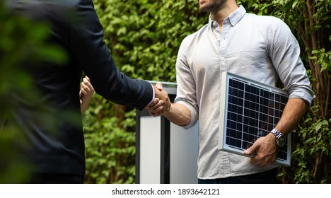 Electrical Engineer Technician And CEO Executive Business People Making Handshake After Meeting. Clean And Green Alternative Energy Concept.