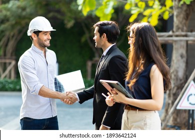 Electrical Engineer Technician And CEO Executive Business People Making Handshake After Meeting. Clean And Green Alternative Energy Concept.