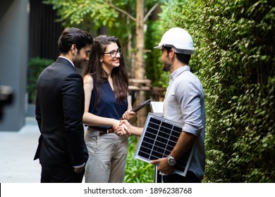 Electrical Engineer Technician And CEO Executive Business People Making Handshake After Meeting. Clean And Green Alternative Energy Concept.