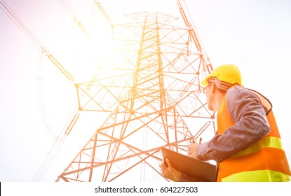 Electrical Engineer Working Check High Voltage Pole Power Transmission