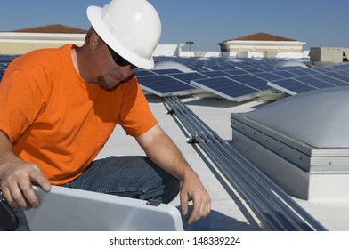 Electrical engineer working at solar power plant