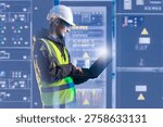 Electrical engineering, technician monitors control panels and analyzes system data on laptop. Industrial power equipment operation, safety inspection and maintenance in energy facility.