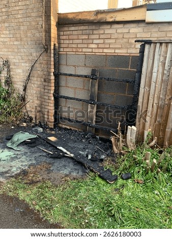 An electrical fire recently occurred here, as you can see the wires melted and then it caught to the wooden fence. Luckily the shed is not made of wood also