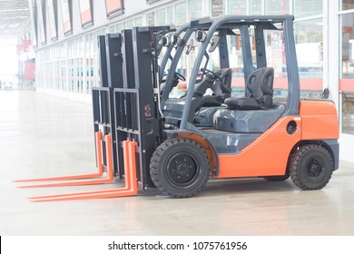 electrical forklift truck for service indurtrail container transport store heavy weight - Shutterstock ID 1075761956
