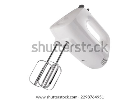 Electrical hand mixer isolated on a white background. Kitchen appliances