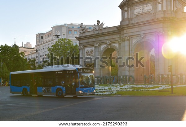 Electrical hybrid\
Mercedes public transportation bus in the morning on the streets of\
Madrid, Spain, 2022.
