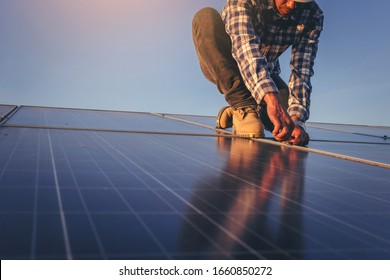 Electrical, Instrument Technician Use Wrench For Fix And Maintenance Electrical System At Solar Panel Field