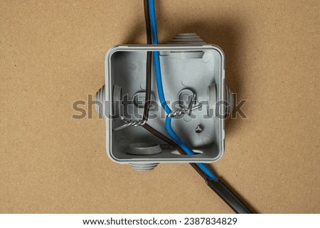 Electrical junction box with cable wire used in the electric installation process