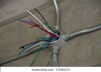 electrical junction box with galvanized conduit pipe connection