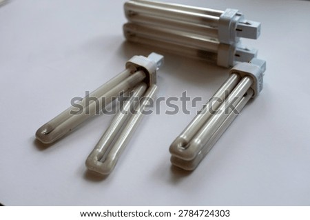 electrical maintenance tools and lighting components on workbench