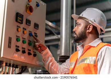 Electrical Mechanical Electronic Plant Engineer Indians in charge of monitoring and maintaining the factory work system to keep it working there is no system disruption in production plant - Powered by Shutterstock