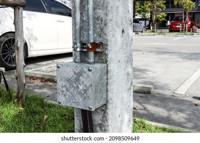Electrical metal box installed under a concrete electric pole. Used to connect to electrical conduits. To prevent leakage current for safety.