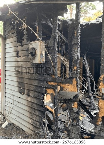 Electrical meter burned on a wall
