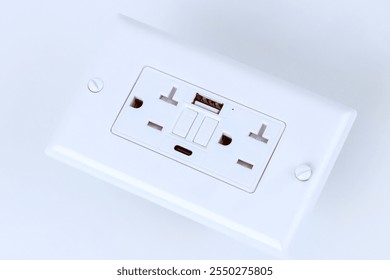 Electrical outlet features multiple sockets USB charging ports, providing convenient Self Test GFI access for powering devices in stylish minimalistic design