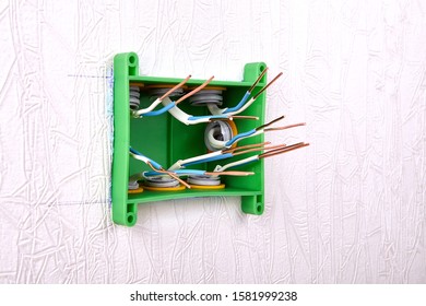 Electrical Panel Of A Distribution Box Or Junction Box With Protruding Ends Of Bare Copper Wires. Household Electric Installation Work, Home Wiring Repair. Upgrade The Power System In The House.