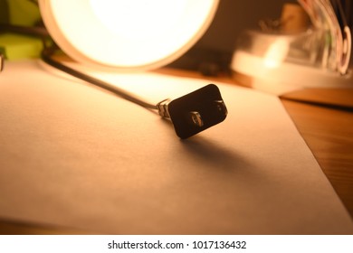 Electrical plug backlit with blank background