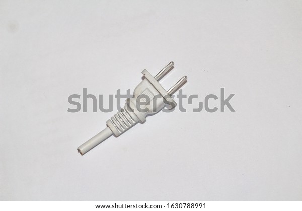 The electrical plug is used to plug in a
white background.