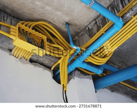 Electrical and plumbing installation in construction projects.