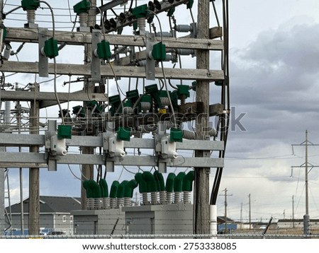 Electrical power distribution station with transformers and grid equipment in countryside