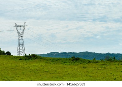 Electrical Power Tower Steel Lattice Structure Supporting Long Distance Overhead High Voltage Direct Current HVDC Electric Lines. Can Be A Suspension/Terminal/Tension/Transposition Transmission Tower.