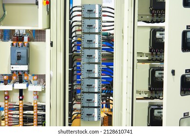 Electrical Room In Building. Multiple Smart Meters, Main Power Breaker, Meter Stacks And Cabinets. Perspective View