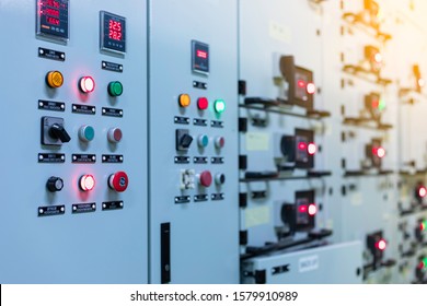 Electrical selector switch,button switch,Electrical switch gear at Low Voltage motor control center cabinet in coal power plant. blurred for background. - Shutterstock ID 1579910989
